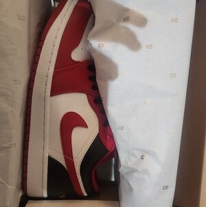 Air Jordan 1 Low, White, and Black Sneakers